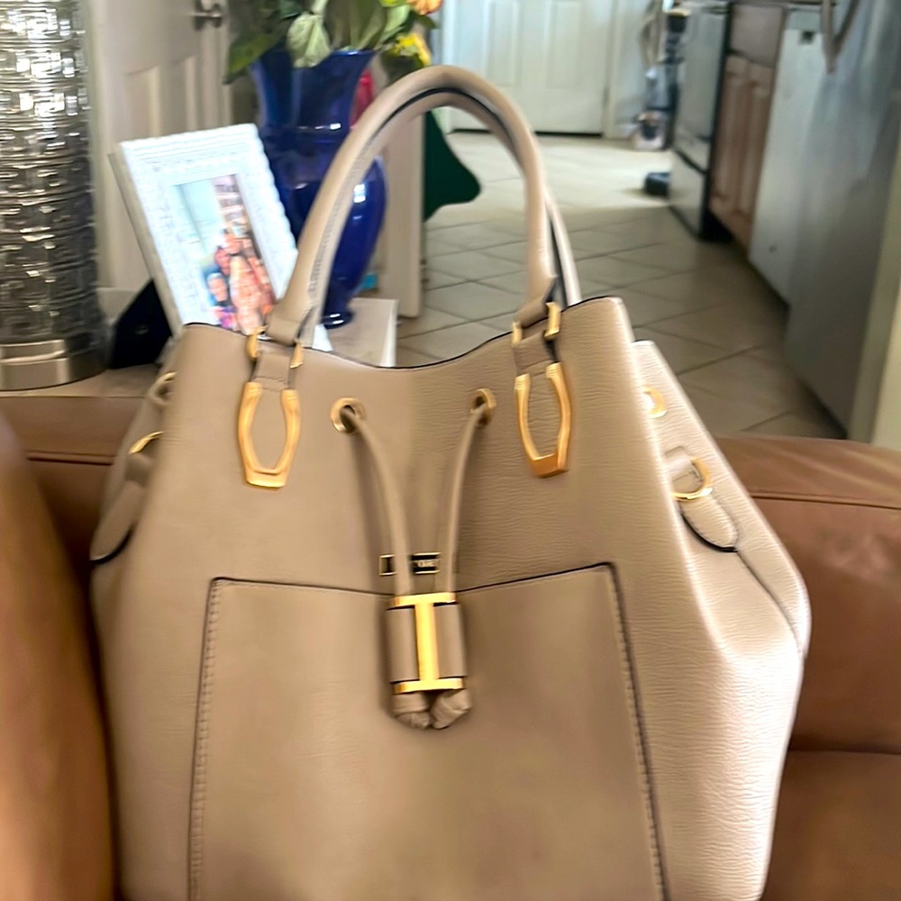Vittorio cream tote with beautiful inside pattern and multiple pockets
